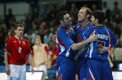 Markin and Khamadiyev congratulating Abyshev on his goal (Photo courtesy: Joe Pepler - UEFA.com)