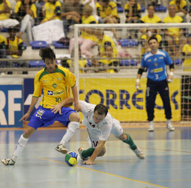 Thiaguinho wearing the brazilian shirt, here vs Belarus* Aleksei Popov (Photo courtesy: CBFS)