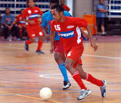 Rewa*s Kamal Hassan goes forward against Nasinu in the final of FUTSAL soccer tournament at the FMF Dome yesterday (Photo courtesy: FIJI TIMES)