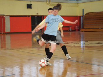 Notre Dame*s U14 Alyssa Oliveira is unleashing one of her infamous "rocket-shots" on goal during game play at Bishop Connolly High School (Photo: www.newenglandfutsal.com)