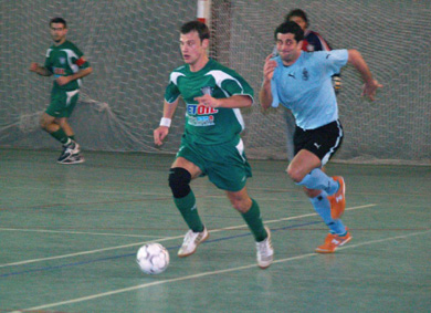 Akis Eliades chased by Yannis Mostrios (Photo courtesy: Costas Chryssafis)