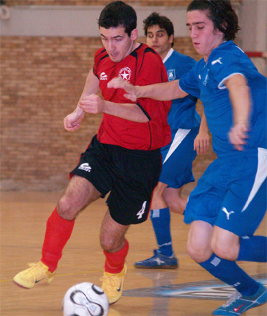 Babis Stavrakopoulos (Doukas) fighting for the ball possession against Ethnikos* Dionisis Stavrakas (Photo courtesy: Costas Chryssafis - Sala News)