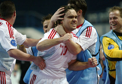 The Hungarian bench can celebrate: Tamas Frank just scored the advantage goal for his team! (Photo courtesy: Joe Pepler - UEFA.com)