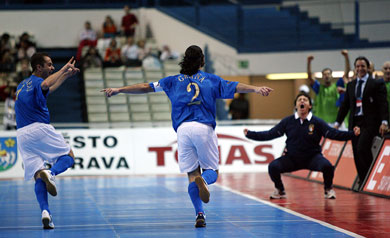 Italian joy: Carlinhos, Nando Grana and Alessandro Nuccorini celebrating the Azzurri*s triumph (Photo courtesy: Joe Pepler - UEFA.com)
