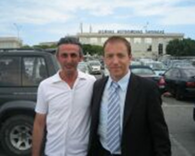 Former FIFA Futsal referee Andreas Demetriou welcomes Laurent Morel at his arrival in Cyprus (Photo courtesy: Yiannis Vakis - Futsal Cyprus)