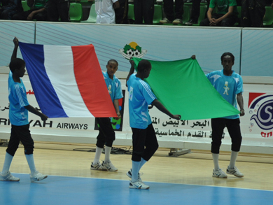 French and Libyan flags entering the pitch... the game is going to begin! (Photo courtesy: Mohammed Zayed)