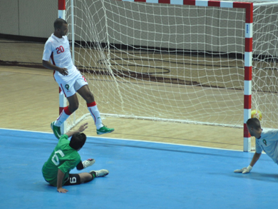 ... scoring that goal! No chance for Morocco*s goalie Rabie Zaari and his team mate Aziz Derrou (Photo courtesy: Mohammed Zayed)
