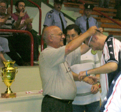 Team Manager Noel Attard Flores receiving a deserved gold medal! (Photo courtesy: Jeepers Handyman Centre Web Site)
