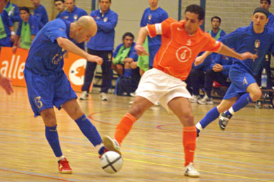 Dutch captain Samir Makhoukhi trying to stop Seco*s attempt while Marcinho is following the action (Photo courtesy: Leo Giovannangelo)