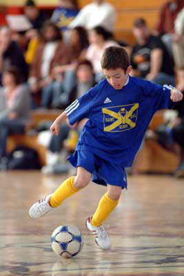 A St. Michael School student in action at the Lafrance Gymnasium (Photo courtesy: New England Futsal)