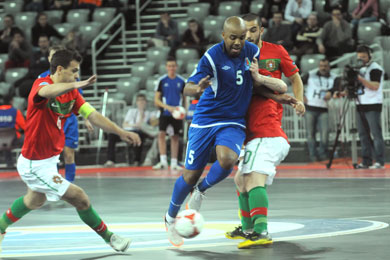 Felipe between Arnaldo, Ricardinho and Joo Matos (Photo Futsalplanet.com)