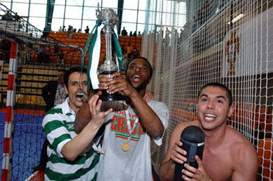 Andrezinho, Beb� and Paulinho running with the Cup! (Photo courtesy: Futsal Sporting)