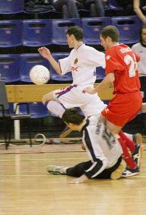 Serguei Sergueev against Oleg Kazakov (#24) and Leonid Klimovsky (Photo courtesy: CSKA)