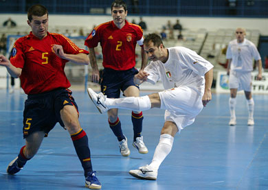 Carlinhos vs Orol and Julio (Photo courtesy: Joe Pepler - UEFA.com)
