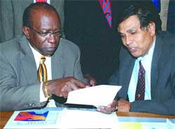 FIFA vice-president and CONCACAF president Jack Warner (left) and Gawtam Ramnanan, managing director of the Hindu Credit Union (HCU)  (Photo courtesy: www.trinidadexpress.com)