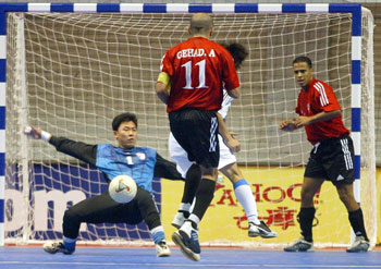 Egyptian player Gehad Sayed trying to score against Chinese Taipei (Photo courtesy: Leadtek Sports)