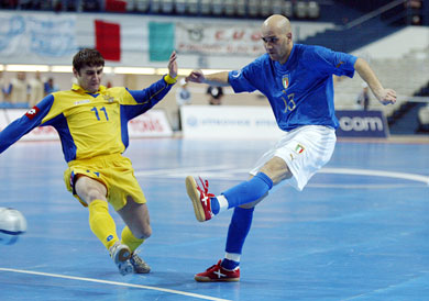 Seco scoring the third Italian goal against the vane opposition by Fedir Pylypiv (Photo courtesy: Joe Pepler - UEFA.com)