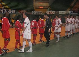 U.S. captain Sean Bowers leads the U.S. through the traditional pre-game greeting line (Photo courtesy: US Soccer)